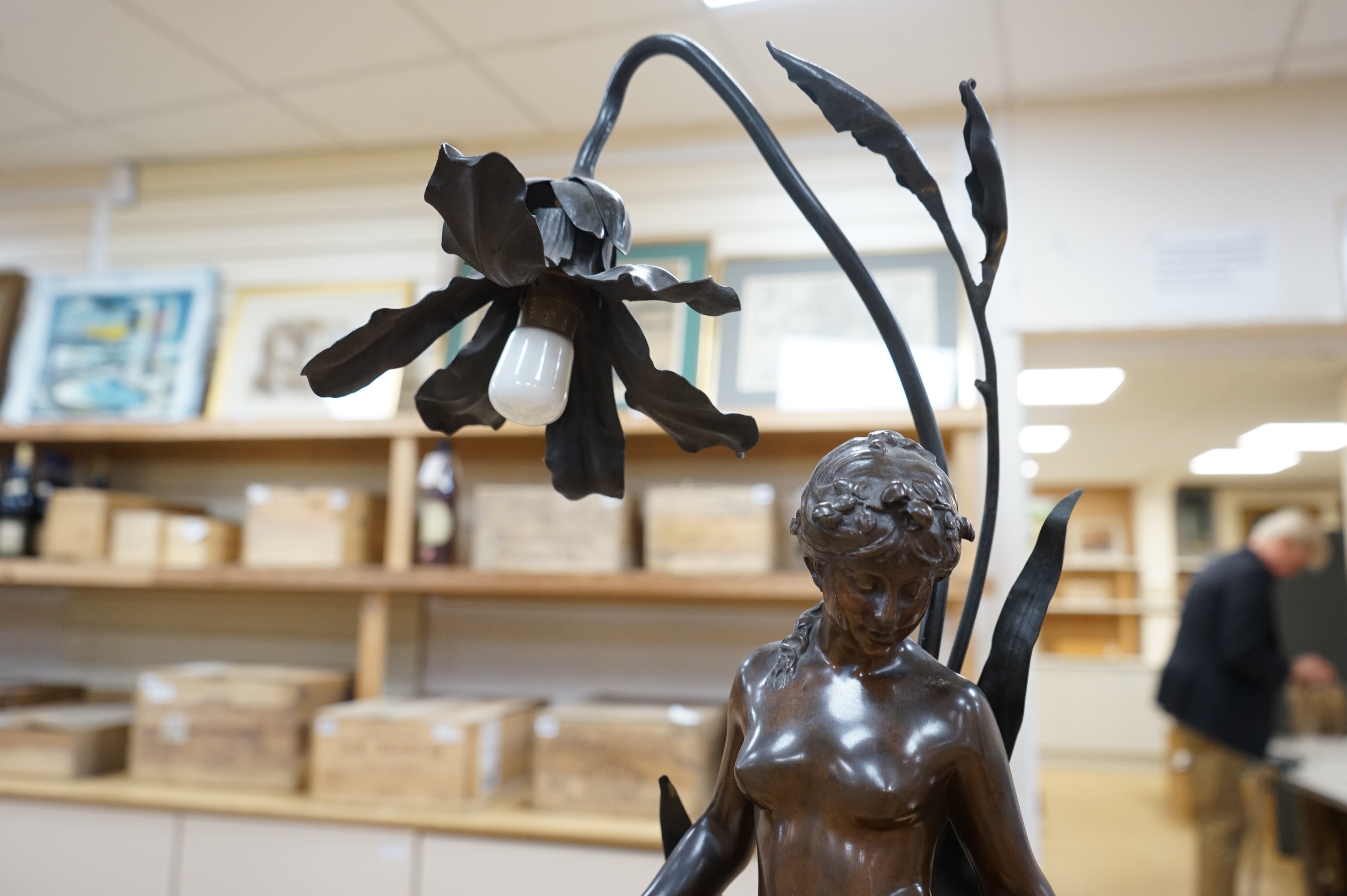 Auguste Moreau, a bronze figure of a nymph on a rouge marble base, later converted to a table lamp, 64cm high., Condition - good